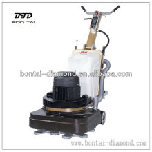 Vacuum connected floor grinder